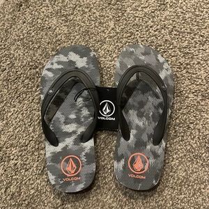 Brand new boys volcom flip flops.